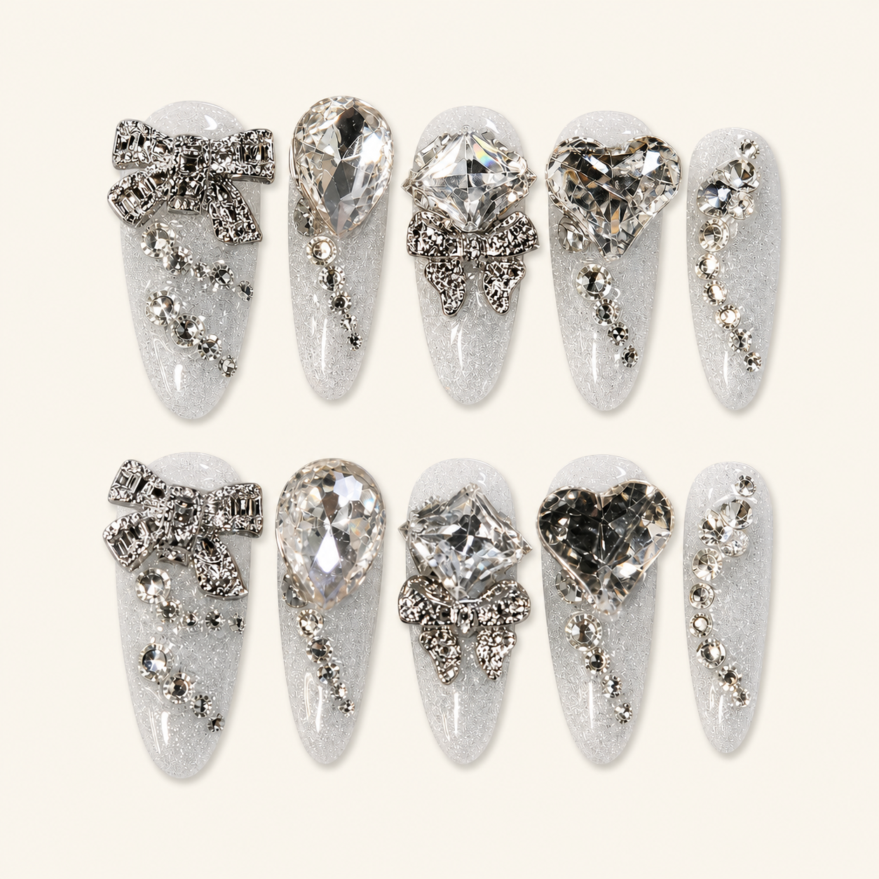 Crystal bridal press-on nails on ivory background