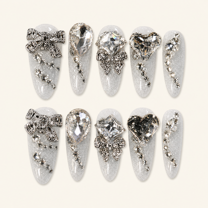Crystal bridal press-on nails on ivory background
