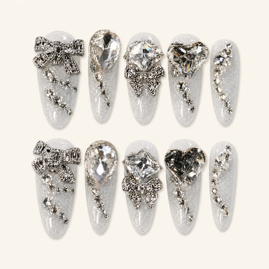 Crystal bridal press-on nails on ivory background
