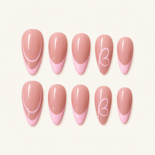 Pink heart French press-on nails on ivory background